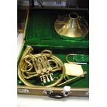 French Horn, brass with extension, tarnished with some small dents in hard case