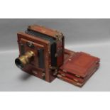 A W. Watson & Sons Mahogany Tailboard Camera, with Perkin Son & Rayment Waterhouse Stop brass lens