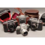 Exa Bodies and Cameras, four examples with various lenses, each with makers case