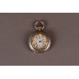 A belle époque lady's silver fob watch, with brightcut and chased decoration to the case, and a