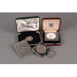 A coin collection, including a 1966 Irish silver shilling, a St. Helena Tercentenary silver crown,