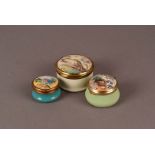 A Bilston and Battersea Enamels kingfisher patch box, plus two larger enamel boxes with