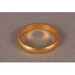A 22ct gold wedding band, the plain ring hallmarked to inner, approx. 6g and size O