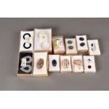 A collection of hardstone and frosted glass stones, for mounting in jewellery including three