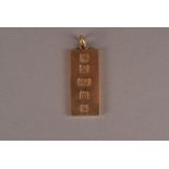 A modern 9ct gold ingot pendant, the rectangular panel with hallmarks to front, approx 30.5g