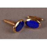 A nice pair of 9ct gold and lapis lazuli cufflinks, with oval blue hardstone panels, hallmarked,