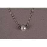 A nice modern pearl and diamond pendant on chain, the fine 18ct white gold chain supporting a