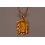 A modern 18ct gold pendant with fine gold panel, the 999 5g ingot marked to reverse and having