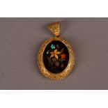 A Victorian gold and pietra dura locket, the oval mount with wire work designs, repeated on the
