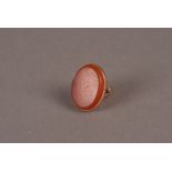 A large vintage hardstone seal signet ring, the oval panel of carnelian with intaglio initials to