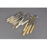 A part set of Mother of Pearl handled and silver plated fruit knives, with turned handles, eleven