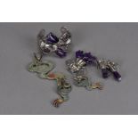 A Mexican suite of silver and amethyst jewels, including a bangle, brooch and pair of earrings,