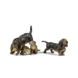 A lead vignette of a Hound with 2 puppies and a model of a Dachshund, adult Hound 9.5cm long,