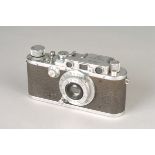 A Leica III Rangefinder Camera, bright chrome, serial no. 128747, with Leitz Elmar f/3.5 50mm