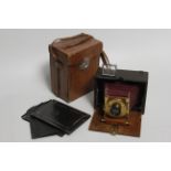 A Photo-Plait Folding Camera, 9x12cm, with unmarked lens in Le Photo-Siecle shutter, body, VG,