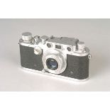 A Leica IIIc Rangefinder Camera, engraved 'FI.No.38079' to top plate, chrome, serial no. 377063,