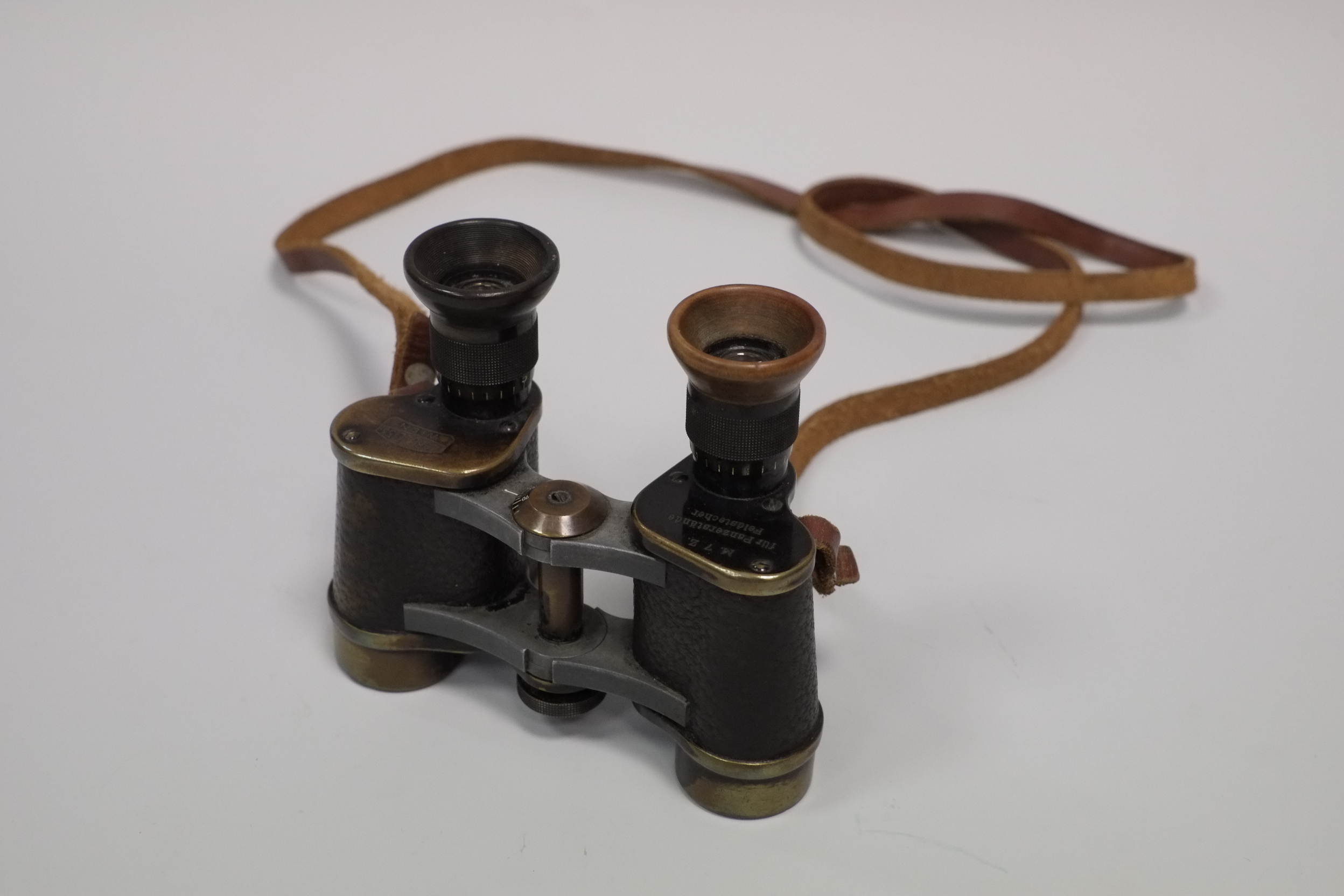 A Pair of Carl Zeiss Wien Binoculars, marked 'M. 7Z. Für Panzerstände Feldstecher', black, serial