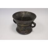 A 17th Century-style Dutch bronze Mortar, circular, with flared rim and ring handles, raised