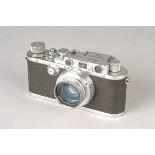 A Leica III Rangefinder Camera, bright chrome, serial no. 135041, with Leitz Summar f/2 50mm lens,