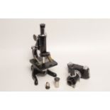 An Ilford Advocate Microscope Special Camera, black, serial no. 33979, with Beck X0.3 adapter in