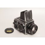 A Hasselblad 500C/M Camera, chrome, serial no. RV1262892, with Carl Zeiss Planar T* f/2.8 80mm lens,