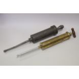 Large Medical Syringes, pewter - equine (1), rectal (3) and brass rectal with label 'Arnold &