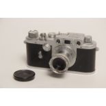 A Showa Optical Leotax F Rangefinder Camera, chrome, serial no. 255264, with Topcor f/3.5 50mm lens,