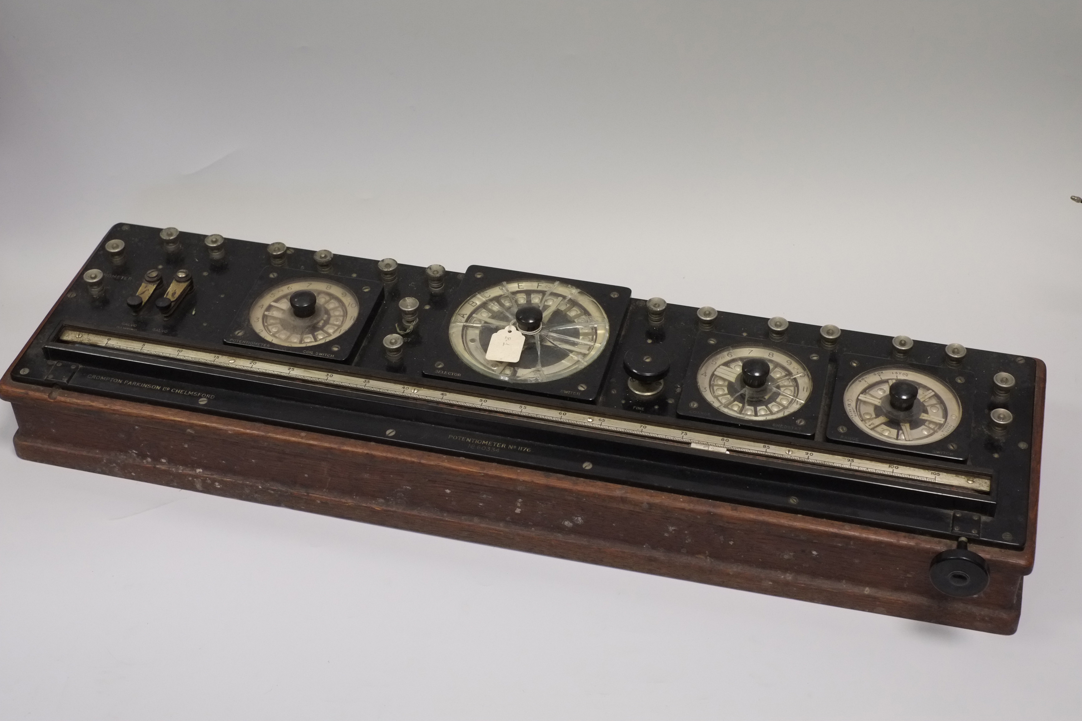 A Crompton Parkinson Potentiometer No 1176, with four glazed silvered dials and adjustable scale,
