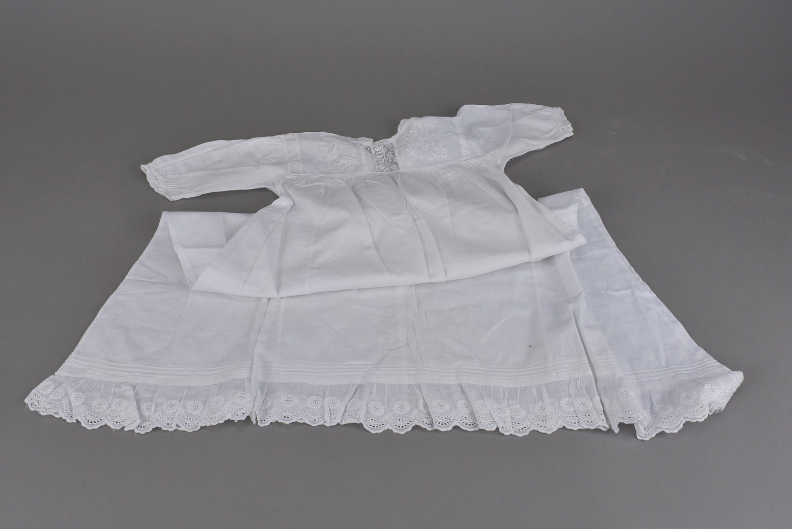 A collection of 19th century and later Christening gowns, veils, bonnets, and more (parcel)