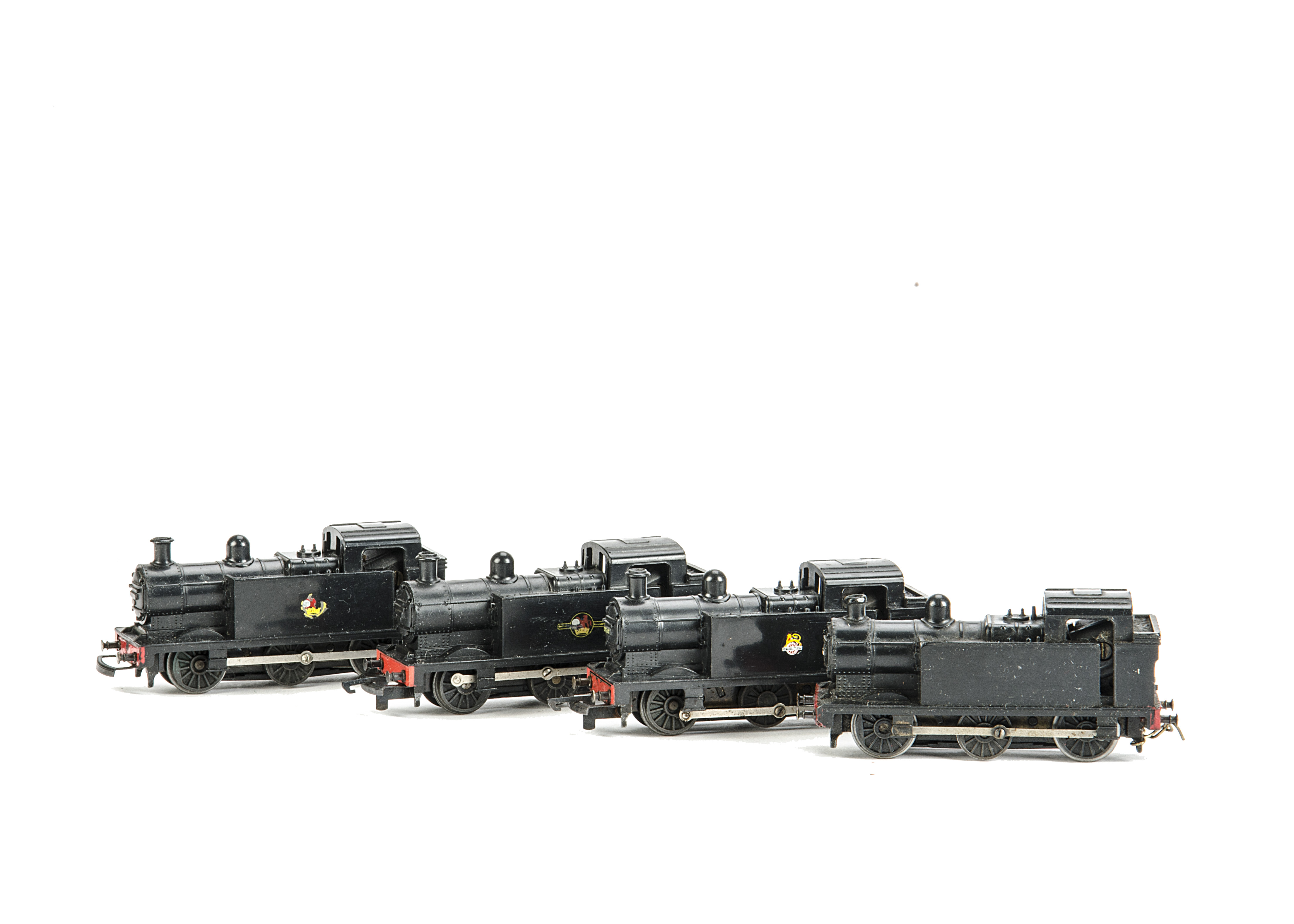 Four unboxed Tri-ang TT Gauge BR unlined black 0-6-0 Tank Locomotives, all with solid driving