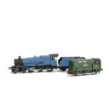 A repainted Tri-ang TT Gauge Castle Class Locomotive and Tender, repainted BR blue and renamed '