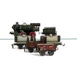 An Early Bub O Gauge Continental '0-4-0' Locomotive and Goods Stock, comprising lined green