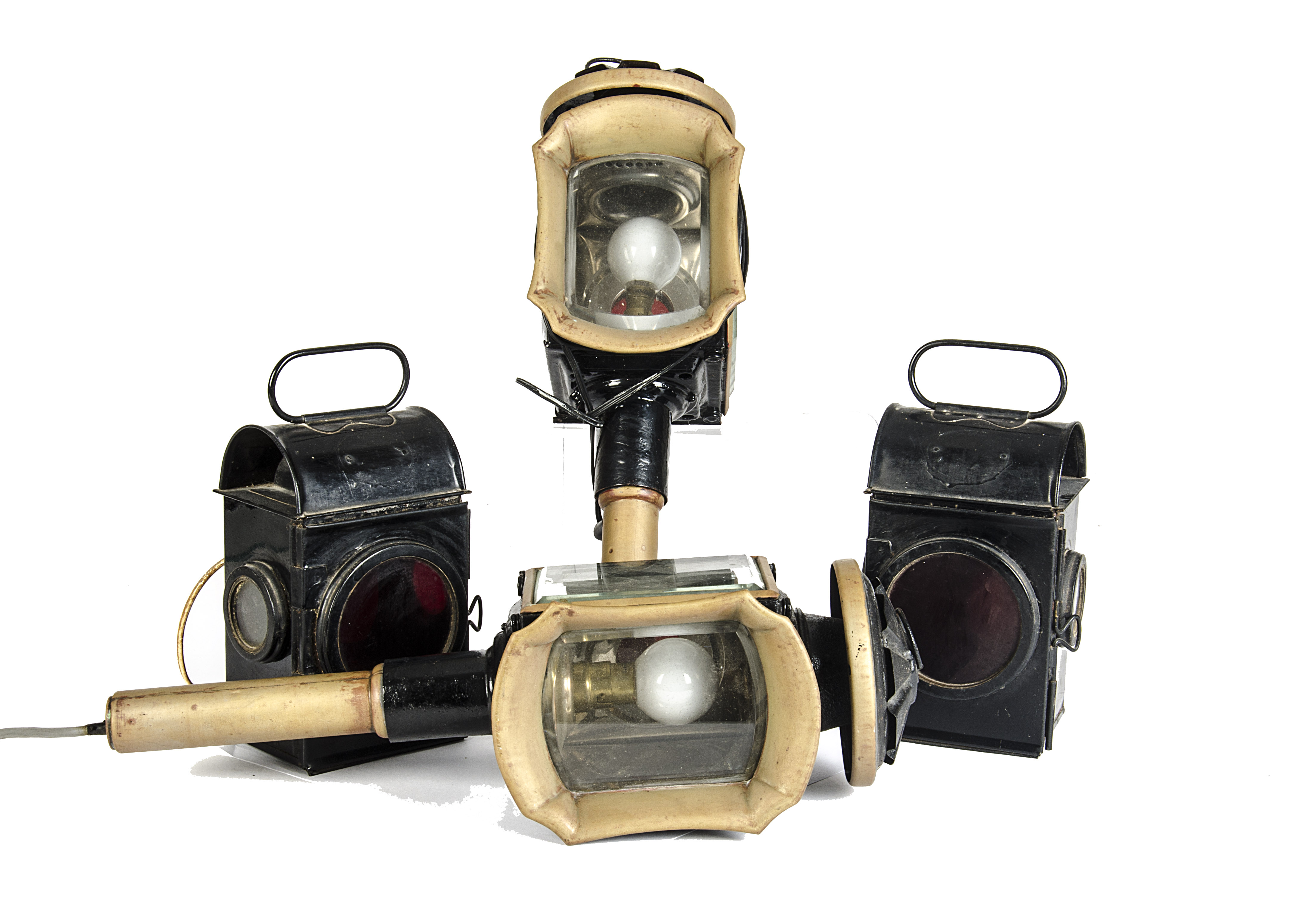 A Group of Four Carriage Lamps, comprising a pair of front lamps by T Rowatt & Sons, both