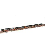 An 8-car Underground Train by Richmond Toys, unpowered and with fixed 'bogies', the whole train