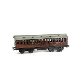 A Carette for Bassett-Lowke Gauge 1 Midland Railway 1st/3rd Composite Coach, in MR crimson livery as