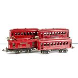 A Lionel O Gauge American 3-rail Electric 253 Locomotive and Coaches, in red/black livery with brass