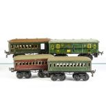 Bing O Gauge Bogie Continental Coaching Stock, including small 0288 coaches in maroon and green, a