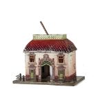 An Early Bing O Gauge (or larger) Continental Station Building, with pink enamelled embossed