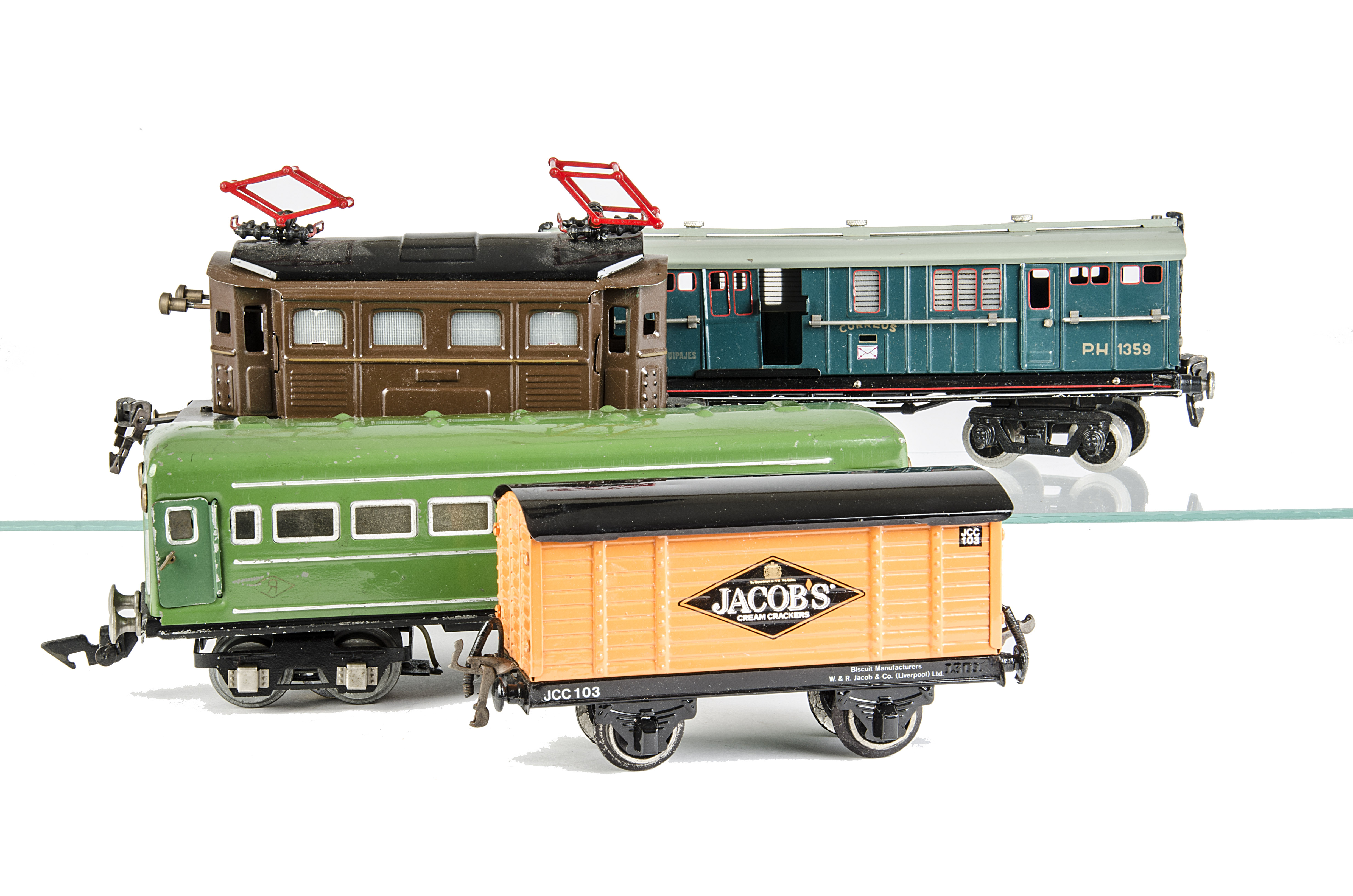 A Continental O Gauge Clockwork Pantograph Locomotive and Rolling Stock by Various Makers, including