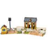 French Hornby O Gauge Tin-printed Station Level Crossing and Signal, the station in red brick with