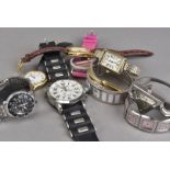 An assortment of gents and ladies modern wristwatches, all of various design and size, an assortment