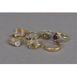 A group of 9ct gold QVC rings, together with a pair of 9ct gold hoop earrings and silver and amber