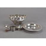 A Mappin & Webb silver dish, marked London, together with a silver bowl on legs, a napkin ring and