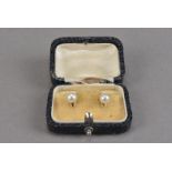 A pair of 14ct gold and cultured pearl dress studs, approx 2g