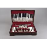 A mahogany canteen of Kings pattern plated flatware, including carvers, forks, knives and spoons,