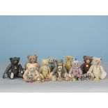 Ten Steiff Enesco porcelain teddy bear, with jointed limbs and metal tags; and a ten pewter