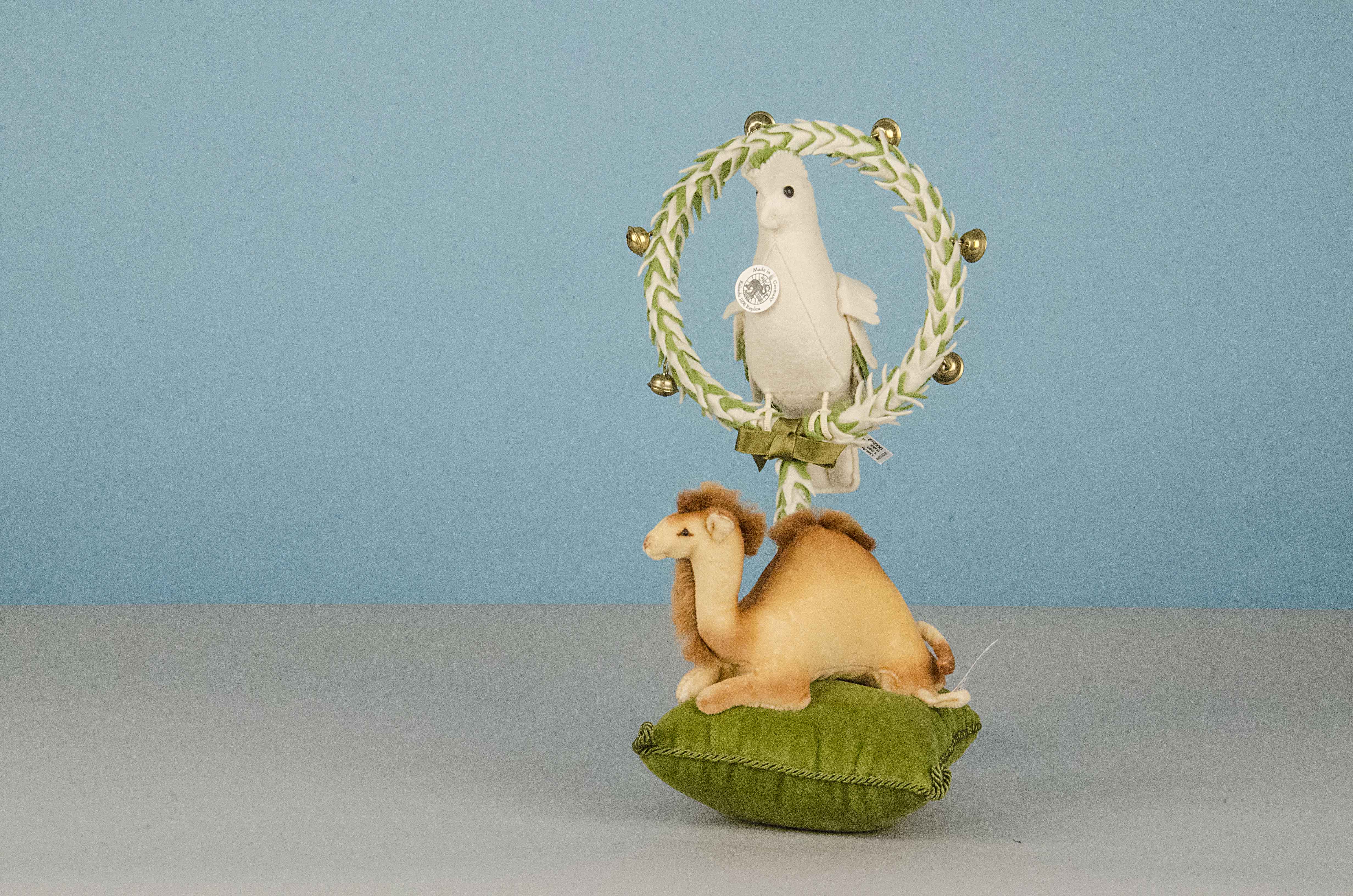 Steiff Limited Edition replica early toys: Cockatoo Rattle 1898, 292 of 1000, 2008; and Camel on