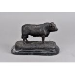 After Jules Moigniez (French 1835-1894), a modern cast bronze study of a bull on naturalistic oval