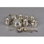 A collection of George V silver cruets by the Northern Goldsmiths Co., and similar designs,