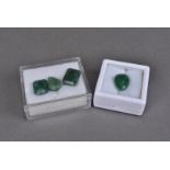 A group of four loose cut emeralds, from EGL, complete with certification, total carat weight 28.